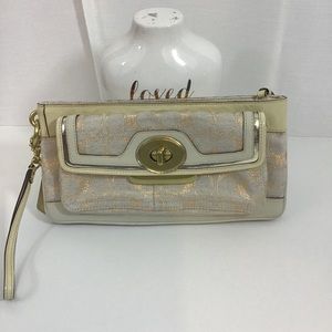COACH beige / cream /gold wristlet / clutch